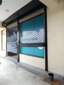 Roller shutter in partially open position showing smooth operation mechanism