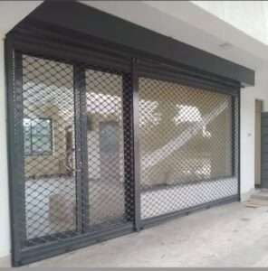 Heavy-duty steel roller shutter securing warehouse entrance in kenya east africa