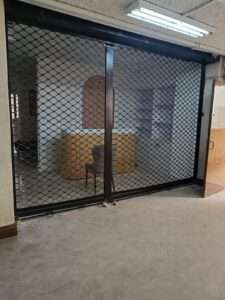 Heavy-duty steel roller shutter securing warehouse entrance in kenya east africa