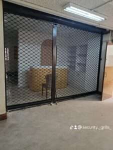 Heavy-duty steel roller shutter securing warehouse entrance in kenya east africa